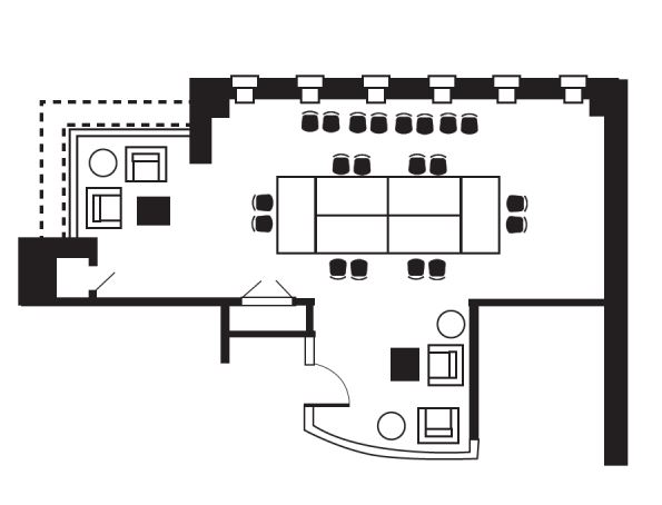 12 chairs around a table