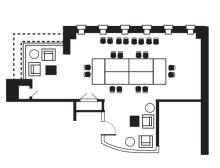 12 chairs around a table